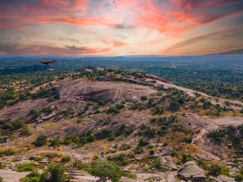 aerial view of enchanted rock with buzzard 