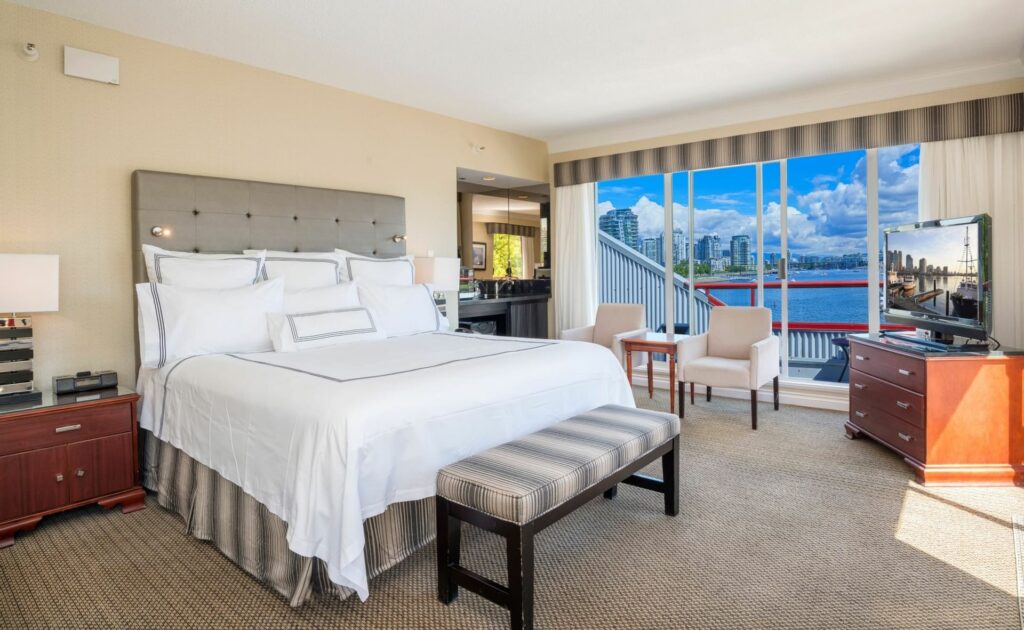 View of the Boardwalk Suite bedroom at Granville Island Hotel"