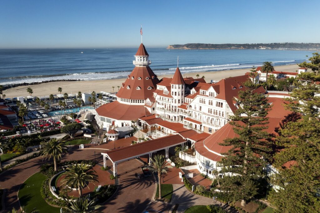 red and white building near sea