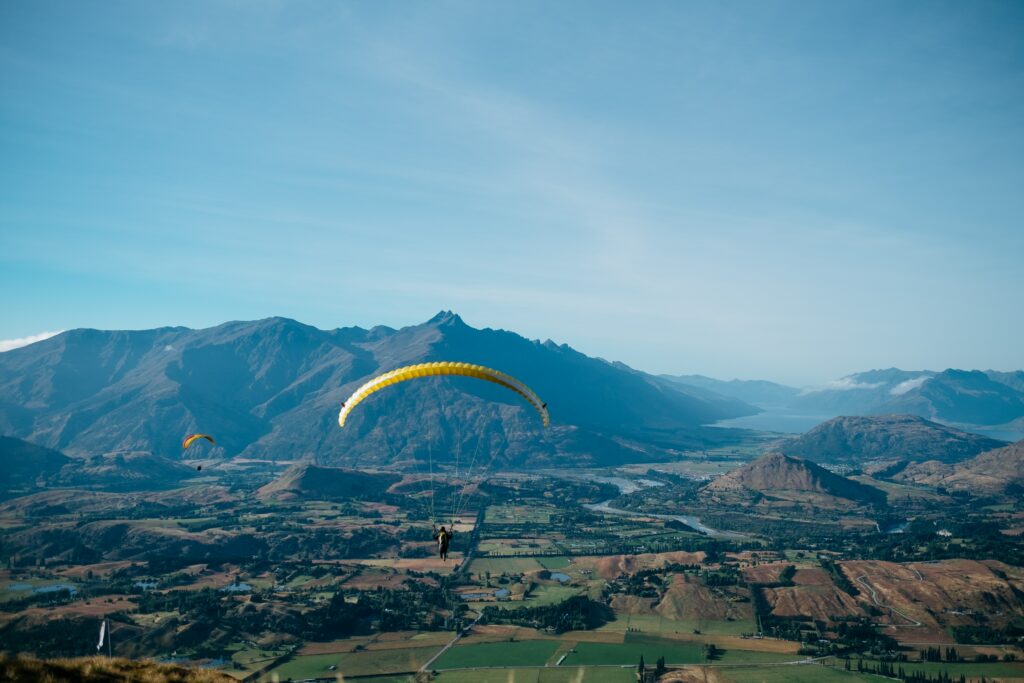 bird's-eye view photography of person in parachute