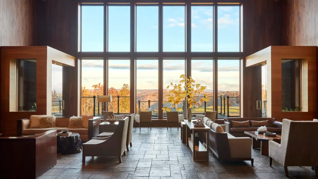 primland resort lounge with big window looking out over fall leave mountain landscape